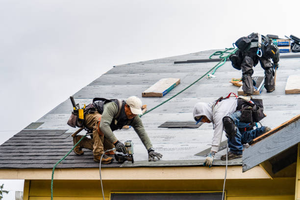 Professional Gutter Installation technician working in Chualar, CA